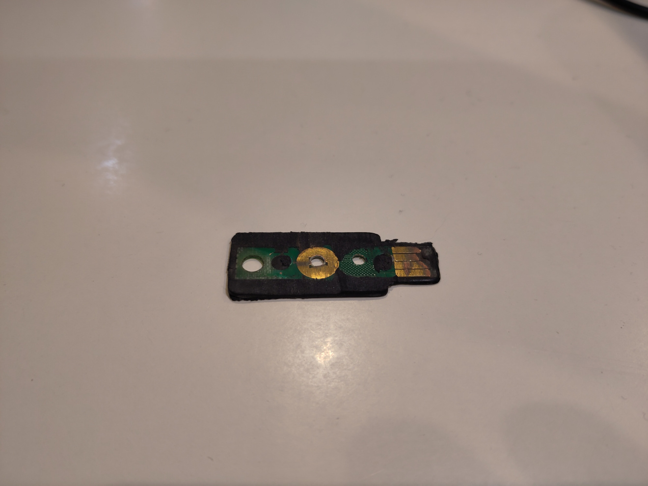 Frontside of a grinded Yubikey